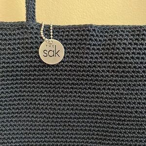 The Sak Navy Blue w/ interior zippered pocket/divider shoulder purse-